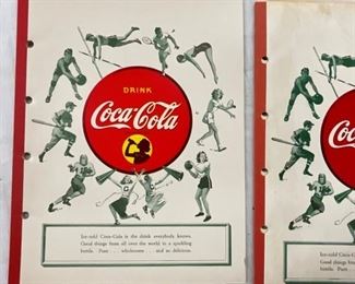 CLOSE UP VIEW COCA-COLA NOTEBOOKS 