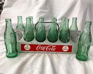 CLOSE UP VIEW W/EMB. BOTTLES