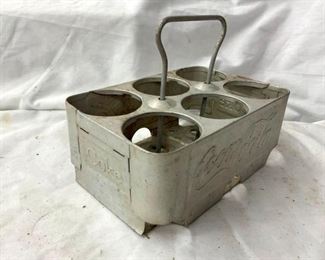 CLOSE UP ALUM. COKE CARRIER