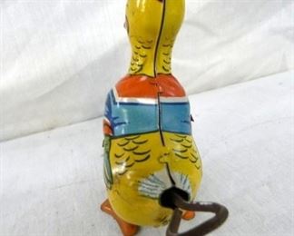 BACK VIEW 4IN. TIN LITHO TOY