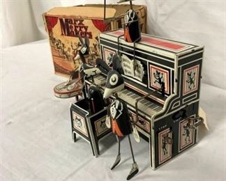 SIDE VIEW EARLY TIN LITHO KEYWIND TOY