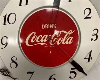 CLOSEUP COCA COLA CLOCK