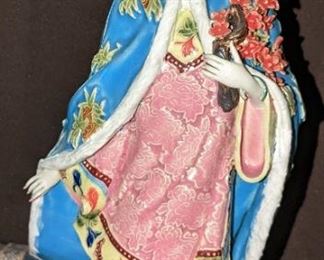 Chinese porcelain maiden.