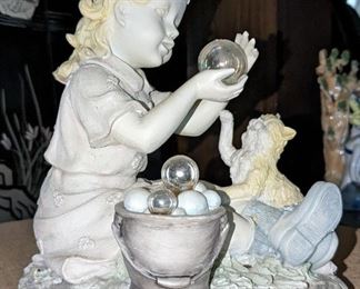 Glass bubbles and girl with kitty.