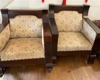 Upholstered mahogany rocker and armchair.