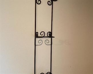 Wrought iron plate holder.