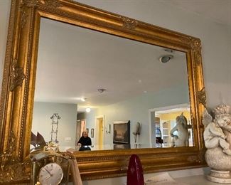 Gilded mirror.