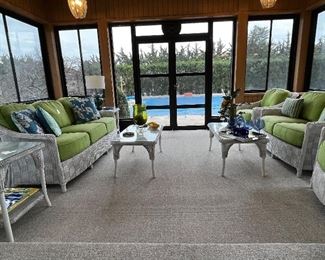 Three season room with a superb set of Lloyd Flanders indoor outdoor wicker furniture