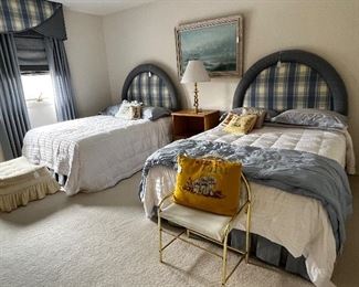 A pair of matching double size beds