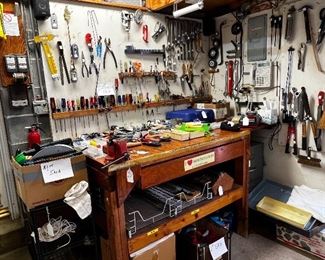 ANOTHER WORK BENCH AREA FULL OF TOOLS