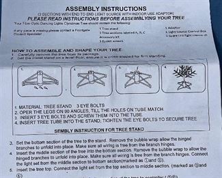 Front gate 7 1/2 foot fiber optic lit Christmas tree in a storage bag