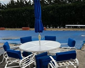 All the pool side furniture is Tropitone commercial grade