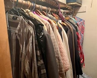 FULL CLOSETS OF WOMAN'S CLOTHES