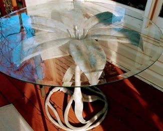 Unique aluminum base sculpture, glass top table. 42" diameter 