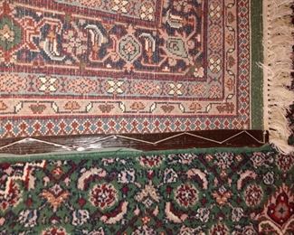 Backside of 9' x 6' handmade wool rug 
