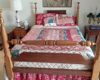 Handcrafted rope bed in Cherry wood. Early 1800s. Converted for present day use, with a full sized mattress and box springs including all linens and quilt dressings.