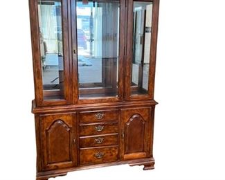 $170  Stunning Stanley Furniture China Cabinet Display Hutch MTF153-1                                      Description: Clean and pretty 3 glass panel front illuminated Stanley china cabinet. Single glass front door, 3 lower drawers flanked by 2 lower cabinet doors. Intricate brass toned hardware, illuminated top is enhanced by the mirror back interior, with interior glass shelving. It is in next to perfect condition. 
Dimensions: 50 x 16 x 76 in
Condition: Used and in very good condition. Only minimal signs of any wear associated with use and age. 
Location: Local pick up Portland, OR.  Shipper suggestions available upon request.  Item is in a warehouse with easy bay door access.