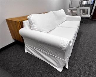 $600  Pottery Barn 92" Sofa w/Slipcovers Cream Cotton Canvas MTF153-5                                    
Description:  Sink into this collection once, and you’ll know how it got its name. Designed with a deep seat with a tailored but casual aesthetic fit for any room of the house.  Slip covers are removeable.  This in a continued PB style and many cover options in fabrics and colors are available through PB.  Love options! 
Dimensions: 92" w x 40.5" d x 37" h
INSIDE SEATING: 73" w x 26" d x 20" h
ARMS: 9" w x 40.5" d x 25" h
LEGS: 5" sq, 3.5" h
SEAT HEIGHT: 20"
32.5"
WEIGHT: 205 lbs
Condition: Used. The sofa is in like new fabulous condition.   Covers show some minor discoloration with one grey spot on the back.  See photo's for more detail.
Location: Local pick up Portland, OR.  Shipper suggestions available upon request.  Item is in a warehouse with easy bay door access.