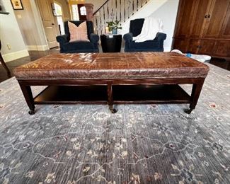 $250   Michael Weiss Leather Top Brown Ottoman Coffee Table Bench LP162-3                               
Description:  A large scale, good looking and useful size brown tufted leather ottoman with brass nail head trim on the skirt. Raised on brown tapered column legs on brass casters. 

Dimensions: 59 x 26 x 18 in

Condition: Please see all detail photos. There is some wear at the connection of the legs to the lower shelf of the Ottoman and expected wear in an even patina overall, slight scrapes to the legs with one area that has had puppy damage.

Location: Local pick up Portland, OR 97068.  Shipper suggestions available upon request.