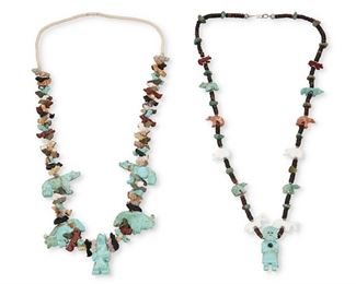 6
Mid/late 20th century
Two Carved Stone Fetish Necklaces
Comprising a Southwest-style fetish necklace with carved turquoise fetish bear pendant and large carved fetish bear and buffalo figures, with smaller multicolored carved bear and fox fetish figures (29" L x 1.75" H), and a Zuni-style carved fetish necklace with Sunface figure pendant and various animal figures (29.5" L x 2" H), 2 pieces
Estimate: $300 - $500