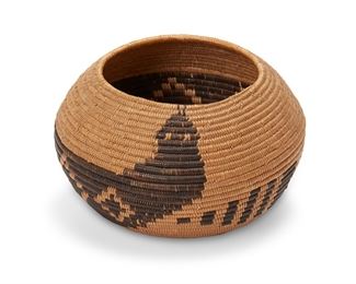 16
Early 20th century; Southern California
A Polychrome California Mission Snake Basket
A small coiled bowl with a coiled snake motif to body
3.75" H x 6" Dia.
Estimate: $700 - $900