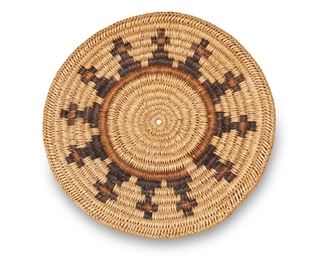 34
Late 20th/21st century
Attributed To Sally Black (B. 1958, Dine)
A Navajo polychrome coiled basketry tray or plaque with a band of stylized figures
1" H x 13" Dia.
Estimate: $200 - $400