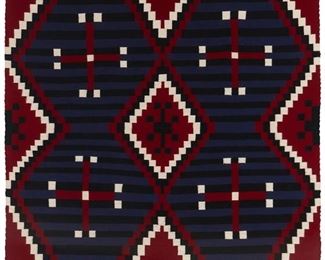 37
Mid-20th century; Dine
A Framed Navajo Moki Revival Textile
Woven in blue, red, cream, and black wool with four conjoined diamonds and spider woman crosses professionally mounted and framed within a plexiglass frame
78" H x 62" W approximately
Estimate: $800 - $1,200