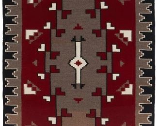 40
Mid-20th century; Dine
A Framed Navajo Ganado Rug
Woven in red, cream, grey, and black wool with a stepped diamond center and an elaborate stepped border professionally framed and mounted to cream linen within a plexiglass frame
62" H x 37" W approximately
Estimate: $700 - $900
