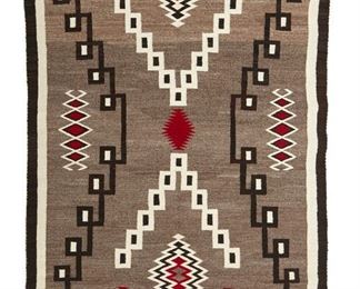 54
Early/Mid-20th century; Dine
A Navajo Storm Pattern Variant Rug
Woven in natural grey, dark brown, cream, and red wool in a storm pattern
78" H x 52.25" W
Estimate: $1,200 - $1,800
