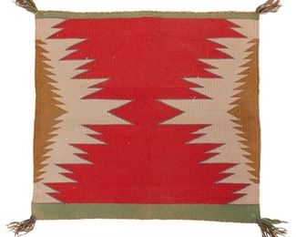 57
Late 19th/early 20th century; Dine
A Navajo Germantown Sampler
Woven in red, grey, brown, and green wool with a serrated hourglass in red, outlined in purple and with green borders
20" H x 20" W
Estimate: $200 - $400