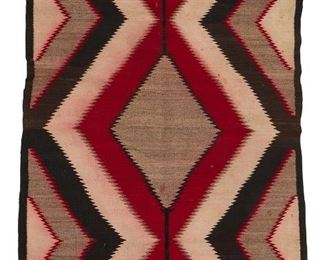 60
Mid-20th century; Dine
A Navajo Regional Rug
Woven in red, cream, and dark brown wool with a serrated central diamond
55.5" H x 41" W
Estimate: $300 - $500