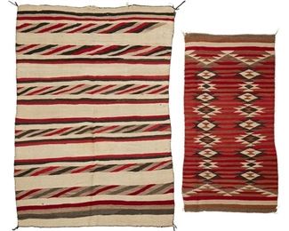 61
Mid-20th century; Dine
Two Navajo Textiles
Comprising a Navajo regional rug woven in cream, red, grey, and brown wool with multiple bands (65" H x 45" W), and a smaller runner-style regional rug woven in brown, grey, red, and cream wool with two columns of serrated diamonds and alternating red and rust bands (54.5 " H x 27" W), 2 pieces
Estimate: $300 - $500