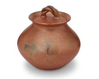 91
Rebecca Ortega (B. 20th Century, Santa Clara Pueblo)
A micaceous pottery vessel
Signed and inscribed to the underside: Rebecca Ortega / Santa Clara Pueblo / New Mexico
The lidded jar with pinched neck, twisted handle, and areas of black fire clouding
9.5" H x 9.5" Dia.
Estimate: $200 - $400