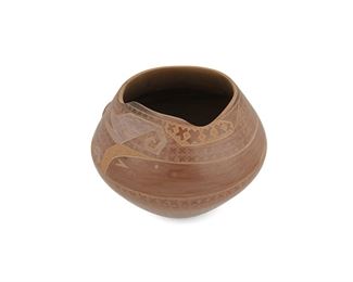 92
Circa 1997
Susan Folwell (B. 1970, Santa Clara Pueblo)
A Pueblo polychrome pottery bowl,
Signed and dated to base: Susie Folwell / 97 / Santa Clara Pueblo
The pottery bowl with an elaborate geometric design of polychrome burnished and painted slip and applied avian motif with sgraffito motifs throughout
4.75" H x 6.25" Dia.
Estimate: $300 - $500