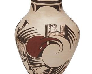 99
Donna Navasie-Robertson, Parrot Girl (B.1972, Hopi-Tewa)
A polychrome pottery vase, late 20th century
Signed to underside with artist's frog and tadpole cipher with "D.R"
The vase with polychrome avian motif and frog emblem on burnished white slip glaze
8.75" H x 5.75" Dia.
Estimate: $300 - $500