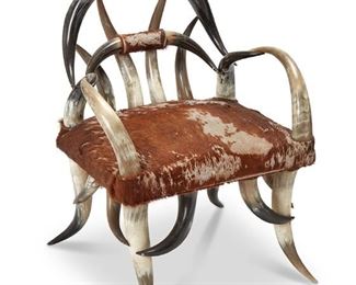 126
20th century
An American Rustic Cattle Horn Armchair
The frame constructed of steer horns with cow hide upholstered seat
28.5" H x 28" W x 22" D
Estimate: $800 - $1,200