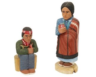 143
Harrison Juan (B. 1953, Dine) And Rena Juan (B. 20th Century, Dine)
Two Navajo carved painted wood figures, circa 1990s
Each marked for artist
Two carved and painted polychrome wood sculptures of Native American figures, one a seated man with cola can (marked: Harrison / Juan / April 14, '92; 6.5" H x 3.5" W x 3.75" D) and a standing woman wearing a blanket and necklace with cola can (marked: Rena / Juan / 93; 9.75" H x 3.5" W x 3.5" D), 2 pieces
Estimate: $100 - $200