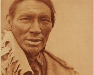 180
Edward S. Curtis
1868-1952
"A Cree," Plate 626 From "The North American Indian" Volume 18
Photogravure in brown on tissue-thin Japanese paper
From the Suffolk Engraving Co., Cambridge MA edition printed after the 1926 original photograph copyrighted by Curtis; with the title, plate number, copyright, publisher, and artist name all printed in the blank outside the image
Image: 15.5" H x 11.625" W; Sheet: 17.375" H x 12.625" W
Estimate: $500 - $700
