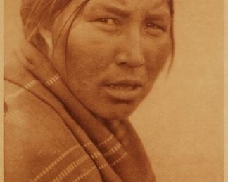 181
Edward S. Curtis
1868-1952
"A Cree Woman," Plate 627 From "The North American Indian" Volume 18
Photogravure in brown on tissue-thin Japanese paper
From the Suffolk Engraving Co., Cambridge MA edition printed after the 1926 original photograph copyrighted by Curtis; with the title, plate number, copyright, publisher, and artist name all printed in the blank outside the image
Image: 15.75" H x 11.5" W; 17.5" H x 12.5" W
Estimate: $500 - $700