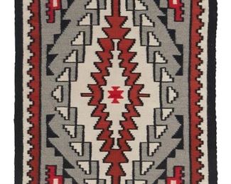 218
Mid-20th century; Dine
A Framed Navajo Teec Nos Pos Rug
Woven in cream, rust, red, grey, and black wool with a central diamond and stepped border, professionally framed and mounted to cream linen within a custom plexiglass frame
53" H x 32" W approximately
Estimate: $600 - $800