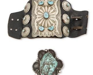 220
Mid/late 20th century
Two Southwest Jewelry Items
Bolo stamped: SE [conjoined]
Comprising a ketoh arm guard with set turquoise and repousse stamped silver, with flanking silver buttons, set to a black leather band (silver: 4" H x 3.125" W; band: 4" H x 9.5" W), and a large set turquoise and silver bolo pendant (3.25" H x 2.75" W), 2 pieces
188.8 grams gross
Estimate: $600 - $800