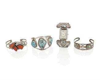 226
Mid/late 20th century
A Group Of Southwest-Style Silver Bracelets
Four works

A turquoise set sterling silver expandable watch band with Nadia dial watch
Stamped: Sterling / [unknown mark]
6.75" minimum inner C x 1.625" H

A set turquoise two wire sterling silver cuff bracelet
Stamped: Sterling / [embossed cactus cipher]
7" total inner C x 1.75" H; with a 1.375" gap

A Felicity Eustace set coral and silver two wire cuff bracelet with overlay motifs
(b. 1927, Cochiti Pueblo)
Stamped: FE
6.75" total inner C x 1.25" H; with a 1" gap

A small Hubble-style sterling silver and set turquoise cuff bracelet
Stamped: Sterling
6.5" total inner C x 1" H; with a 1.25" gap

4 pieces
177.8 grams gross
Estimate: $200 - $400