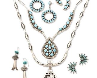 233
Mid/late 20th century
A Group Of Southwest Jewelry
Seven works:

Jeff James Jr.
(b. 20th century, Dine)
Each stamped: JJJ / Sterling
A long Navajo sterling silver chain necklace with narrow openwork silver crescent, and a sterling silver shadowbox storyteller pendant with turquoise drop
Necklace: 27" L x 1.5" H; pendant: 3.25" H x 1.375" W
2 pieces

Lee Charley
(b.1968, Dine)
Each stamped: LC / Sterling
A pair of Navajo cluster set turquoise round earrings
Each: 2.375" H
2 pieces

A sterling silver and cluster turquoise necklace with a pair of matching earrings
Necklace stamped: Sterling
Necklace: 21" L x 2.125" H; each earring: 1.75" H
3 pieces

Two pairs of Southwest-style earrings including a pair of squash blossom dangle earrings (Each: 2.25" H) and a pair of Zuni-style petit-point clip earrings (Each: 1" H), 4 pieces

11 pieces total
181.9 grams gross
Estimate: $300 - $500
