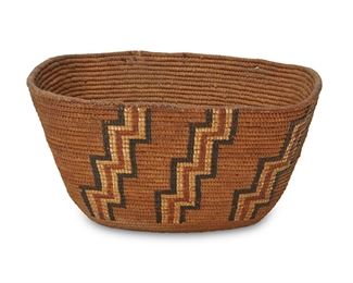 247
Early 20th century; Northern California
A Polychrome Thompson River Basket
A twined rectangular form basket with polychrome imbricated stepped motifs to exterior
6.25" H x 11.5" W x 9.75" D
Estimate: $400 - $600
