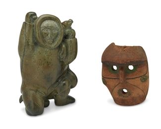 249
Two Northwest Coast And Inuit Carvings
Two works:

A Northwest Coast carved cedar mask
Early 20th century
With traces of pigment and fiber hair
9.75" H x 7.75" W x 5.25" D

An Inuit carved soapstone figure
20th century
Depicting a figure in a coat hoisting a deer over their back
16.5" H x 9.25" W x 5.25" D

2 pieces
Estimate: $600 - $800