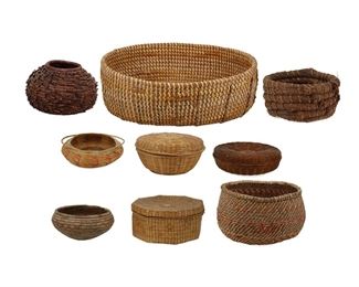 255
Mid/late 20th century
A Mixed Group Of Baskets
Comprising two Kumeyaay baskets, one a coiled pine needle tapered bowl with spaced stitching radiating from base (4.75" H x 7.75" Dia.) and the second a coiled pine needle bowl woven with thick bundles of thin pine needles (4.5" H x 9" Dia.); two Seminole baskets including a two-handled basket stitched with polychrome embroidery thread with a palmetto husk base (2" H x 6.75" Dia.) and a large oval coiled pine needle basket (4.75" H x 15" W x 13.75" D); two twined lidded sewing baskets (largest: 3.5" H x 7" Dia.); a Coushatta polychrome twined bowl with banding (5.5" H x 9.75" Dia.), a polychrome twined octagonal lidded sewing basket (3.5" H x 7.75" Dia.) and a small polychrome coiled bowl (3.25" H x 6.5" Dia.), 9 pieces
Estimate: $100 - $200