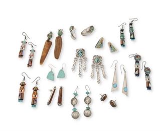 267
Late 20th/21st century
A Group Of Southwest Earrings
Two marked for maker/artist; four marked for sterling
Comprising thirteen pairs of earrings in various styles and materials including a pair of HG sterling silver turquoise and multi-stone inlay earrings (1" H), a pair of Paul P.J. Begay Navajo sterling silver set stone earrings (Dine; 0.75" H), a pair of coin-style earrings (2.5" H), and a pair of turquoise bead and wood dangle earrings (3" & 3.5" H), as well as four pairs of painted wood earrings depicting various katsina figures (Largest: 2" H), 26 pieces
66.8 grams gross
Estimate: $100 - $200