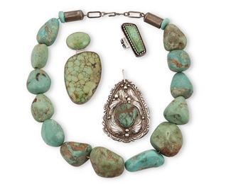 272
Mid/late 20th century
A Group Of Southwest-Style Jewelry
Four works:

An Alvin Tso Navajo silver and turquoise ring
(b. 20th century, Dine)
Stamped: Alvin Tso / Sterling
A sterling silver ring with narrow oblong set turquoise and geometric overlay to band
Ring size: 8.75; 1.5" H

An Everett /Mary C. Teller Navajo turquoise and silver pendant
(b. 1956, Dine; b. 20th century, Dine)
Stamped: EMT [within fish] / Sterling
A large set turquoise and silver two-stone pendant
3' H x 1.1.5" W

A Billie Eagle Navajo silver and turquoise pendant
(b. 20th century, Dine)
Etched signature: Billie Eagle
A large silver teardrop pendant with applied foliate motifs and central set turquoise
2.625" H x 1.875" W

A large chunky graduated turquoise stone necklace
Appears unmarked
20.5" L

4 pieces
Weighable items: 95.7 grams gross
Estimate: $300 - $500