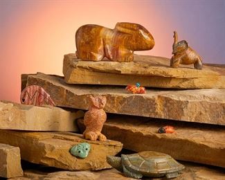 280
Late 20th/21st century
A Group Of Zuni Stone Fetish Animals
Each variously marked
Comprised of a dolomite rabbit and a travertine onyx rabbit (Tyler Quam), a turquoise frog and an apple coral and jet ladybug (Georgette Quam), a Picasso marble elephant with raised trunk and a fossil stone owl (Caspar Quam), an alabaster heartline bear (E. Quam) and a serpentine sea turtle (Ephran Chavez), 8 pieces
Travertine onyx rabbit: 2.25" H x 4.75" L
Estimate: $100 - $200