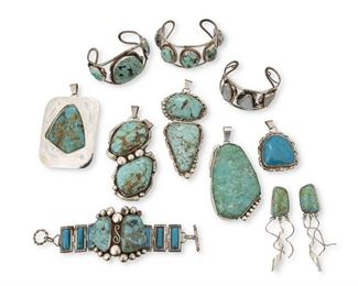 290
Mid/late 20th century
A Large Group Of Southwest Jewelry Items
Nine with embossed cactus pictograph; nine further stamped: Sterling

Ten works comprising five large sterling silver and set turquoise pendants, two with double set turquoise slabs and three with single set turquoise slabs (Largest: 4.5" H), three two-wire and stone set cuff bracelets, including two cuffs with turquoise set stones (Largest: 7" total inner C x 1.75" H) and one cuff with set opals (6.75" total inner C x 1.5" H), a two-toned turquoise link cuff bracelet with two large central set turquoise stones and darker blue narrow stones set to the links (6.75" L x2" H), as well as a pair of set turquoise pierced earrings with curly silver wire dangles (Each: 3.5" H), 11 pieces
574.7 grams gross
Estimate: $400 - $600